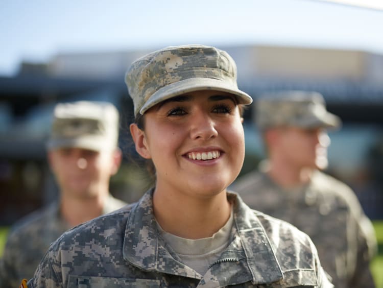 service member smiling outside of GCU arena