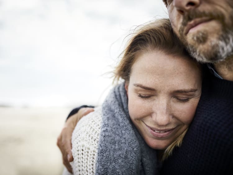 woman leaning on person