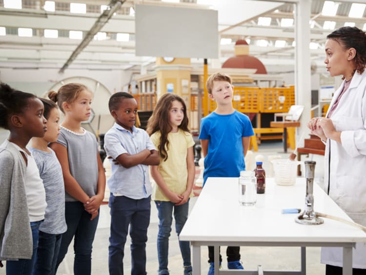 science teacher teaching lab