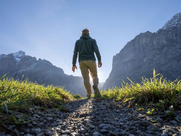 man standing in nature looking forward