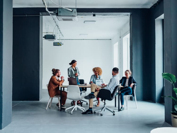 workers meeting in a modern office