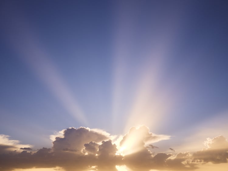 sun peeking through the clouds