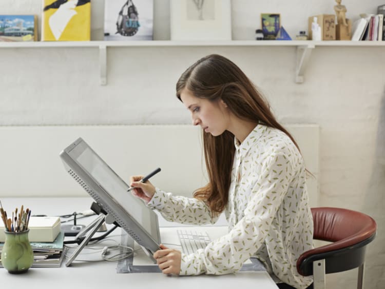 a graphic designer working in her home office