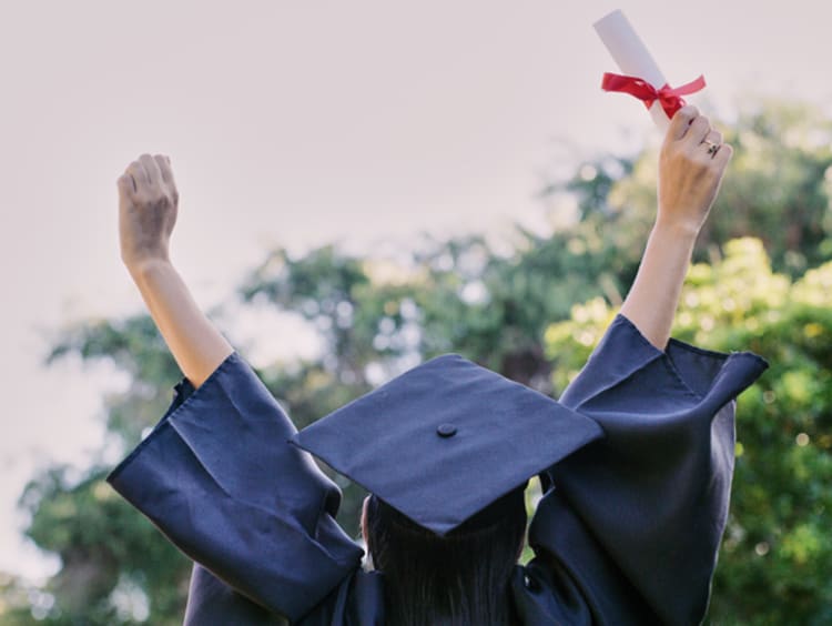 Graduation, education and success with a woman student holding a diploma or certificate in celebration outdoor. University, graduate and study with a female pupil cheering a college achievement - stock photo