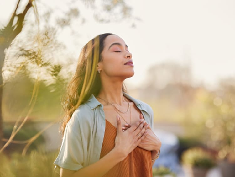 A girl at peace in nature.