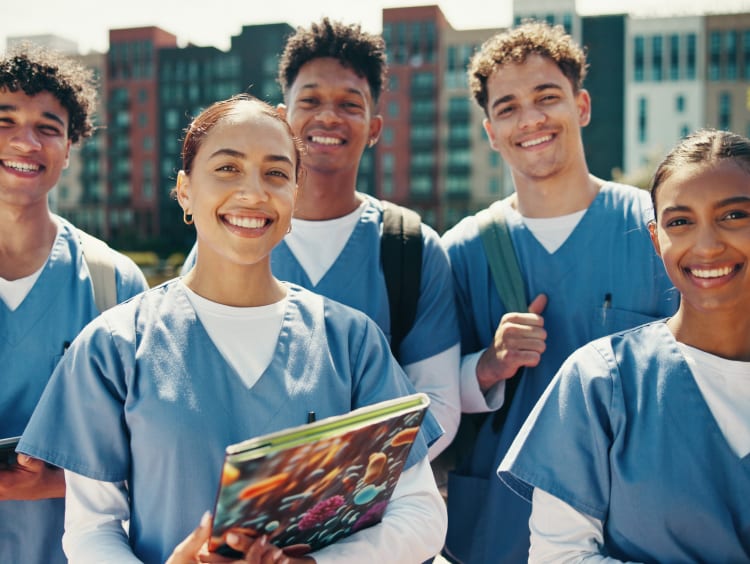 nursing students smiling at the camera