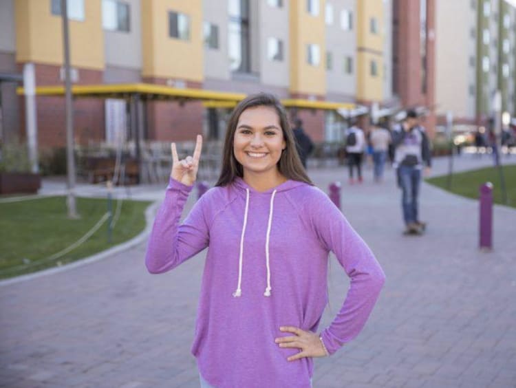 Tatum in front of Lopes Way