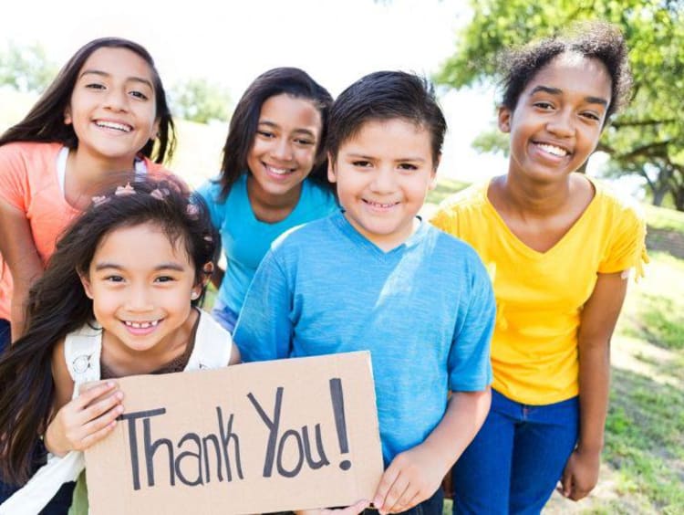 students saying thank you to a teacher