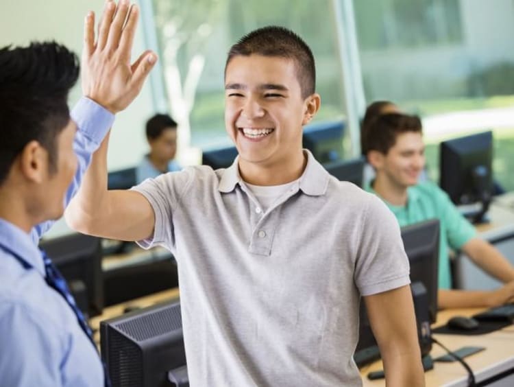 two people high fiving