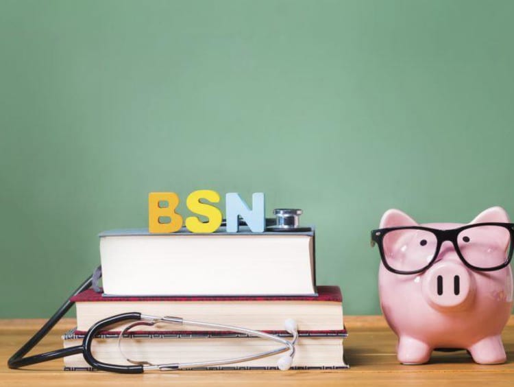 Piggy bank and books stacked