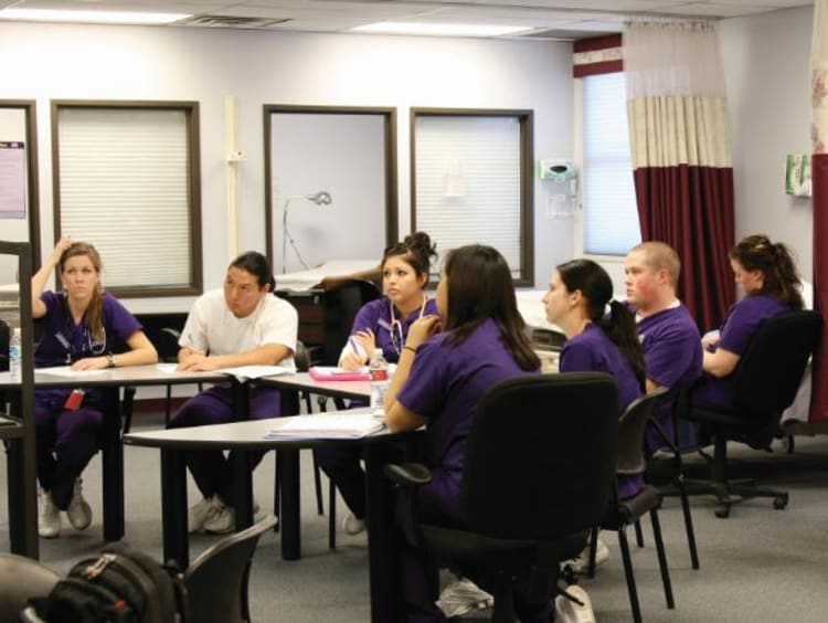 Students studying in a classroom.