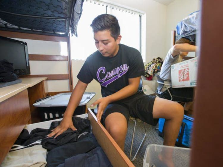 boy in dorm room