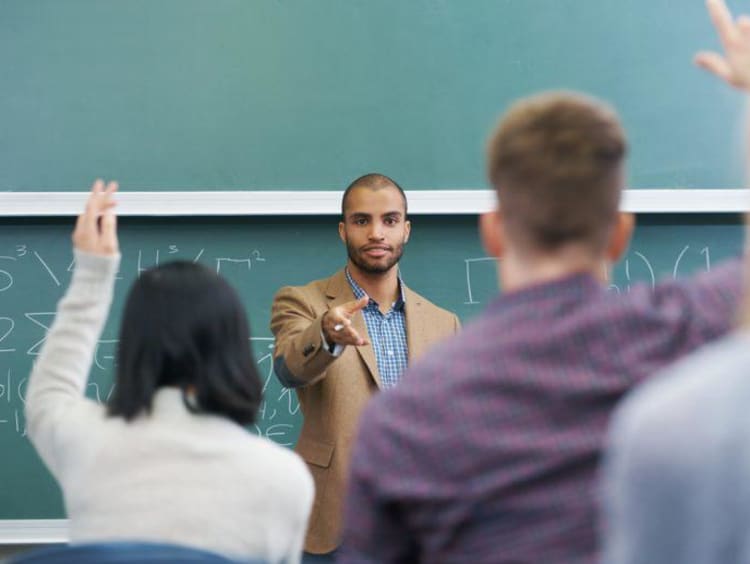 Class of adult students and teacher