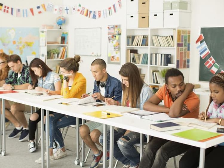 diverse group of students sitting together