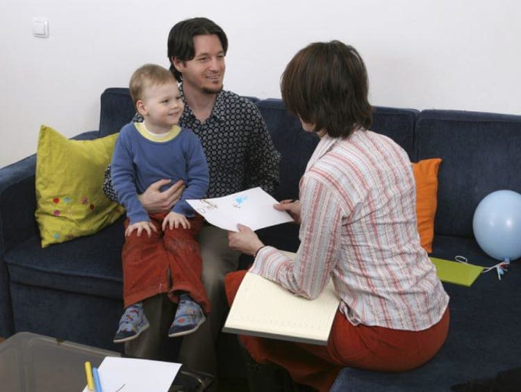 Woman counseling a child