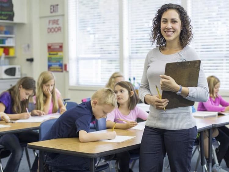 elementary teacher smiling