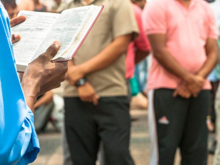 A person preaching in the street