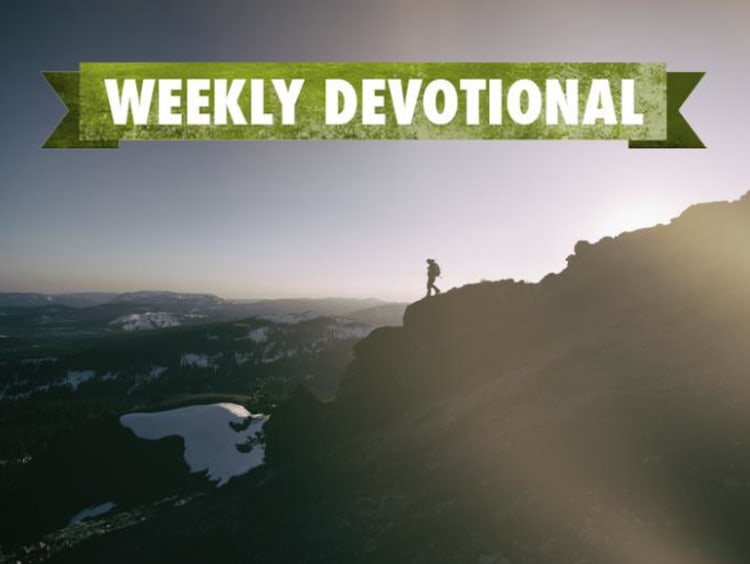 Weekly Devotional: Someone climbing down a mountain