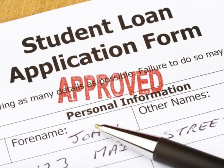 student loan application form with "approved" stamped on it