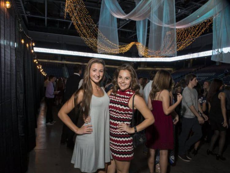 two girls posing for a picture