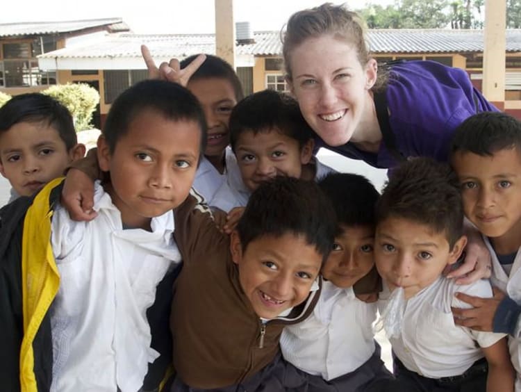 GCU student with group of kids