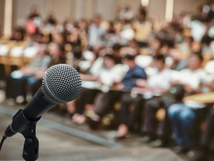 microphone in front of large audience