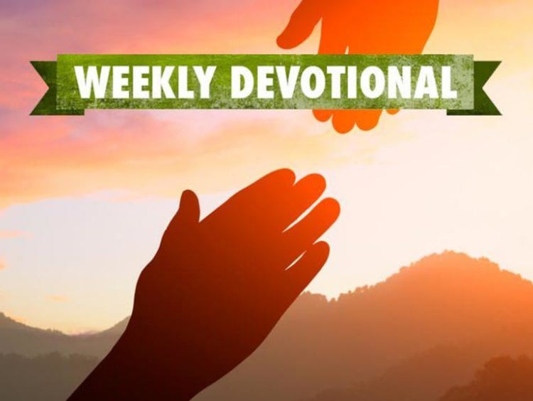 Weekly Devotional: Two hands reaching for each other