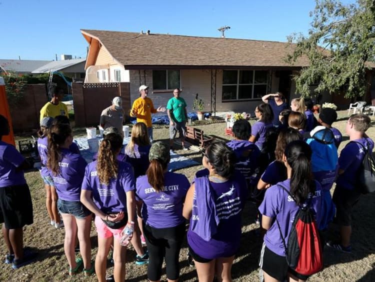 students at a community outreach event