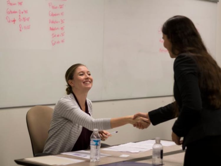 Honors student shaking teacher's hand