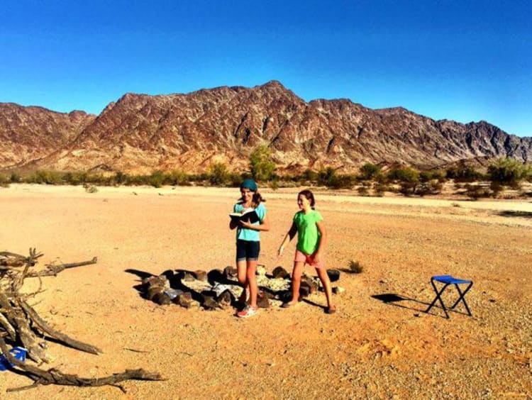 Students playing outside in the desert