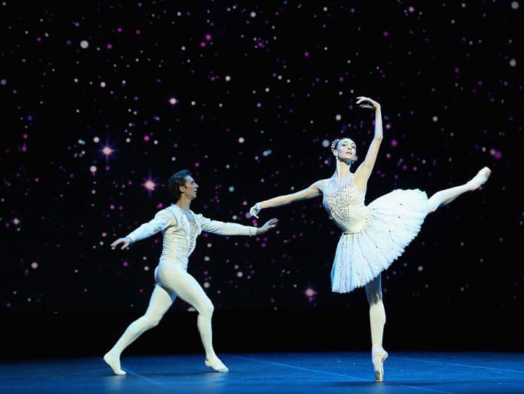 Performers dancing on a stage