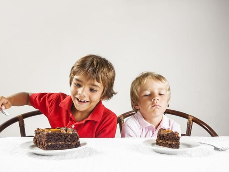 kids eating chocolate cake