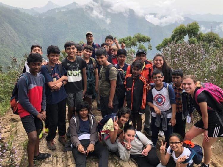 teacher and her students in India