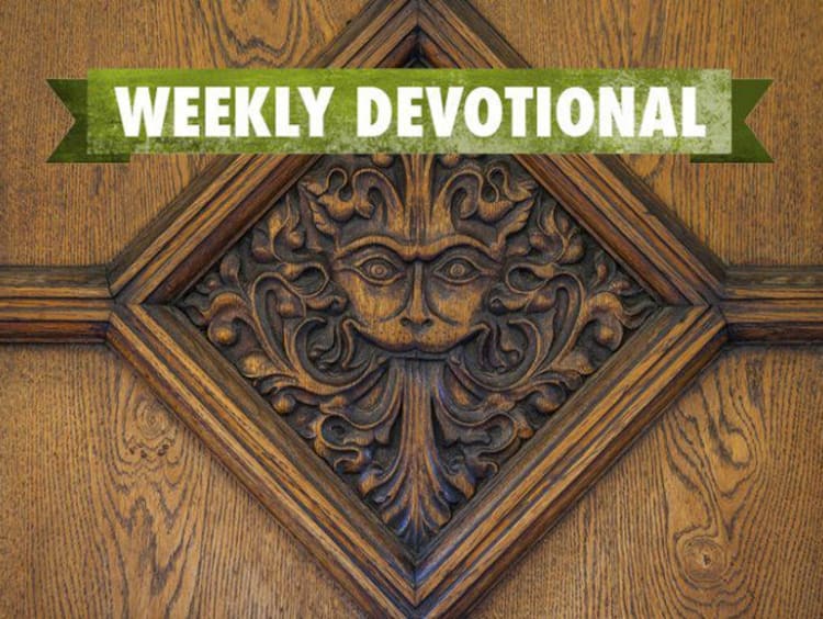 Weekly Devotional: Wooden tile with a face engraved