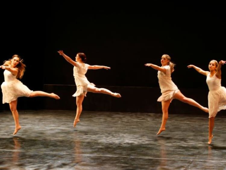 Dancers performing on stage