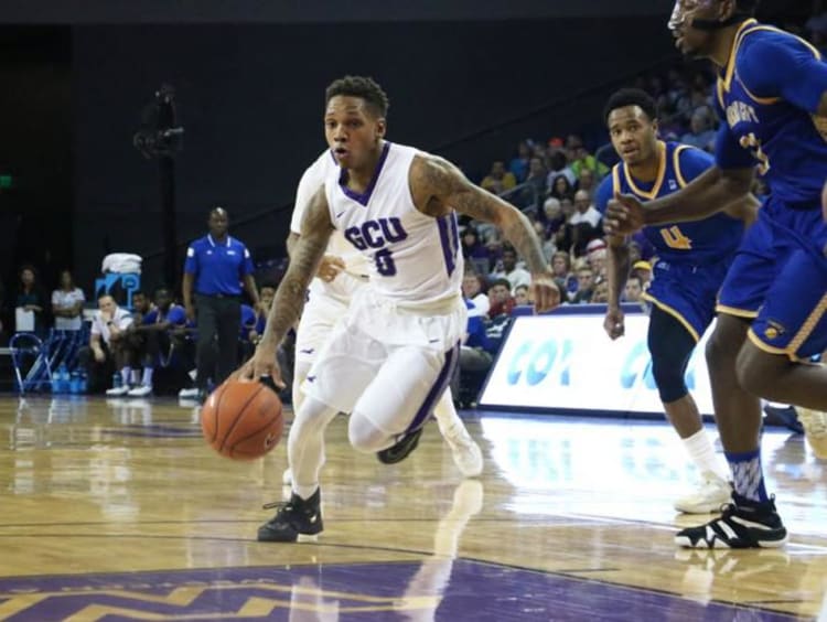 basketball player dribbling basketball