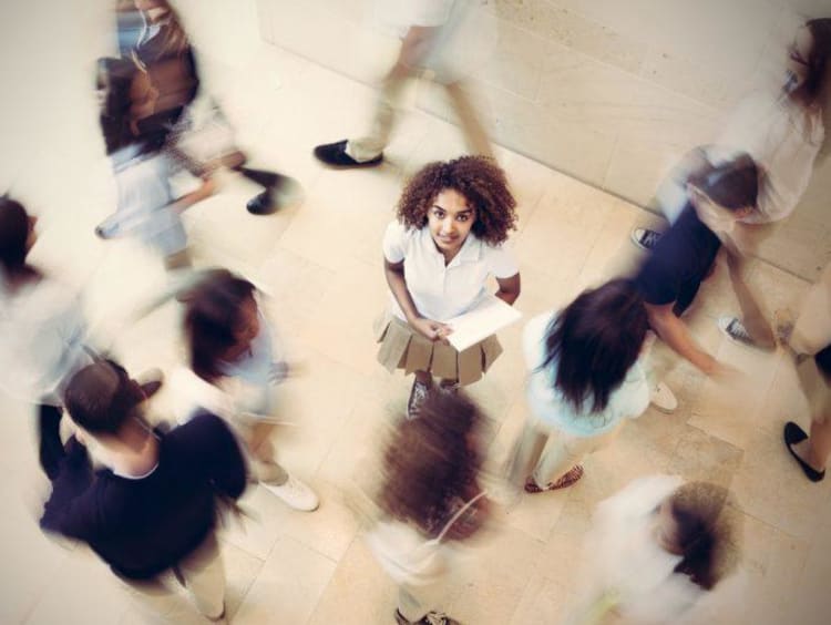 A group of busy people going about their days