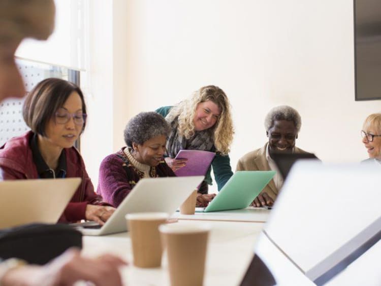 Employees collaborating during a meeting