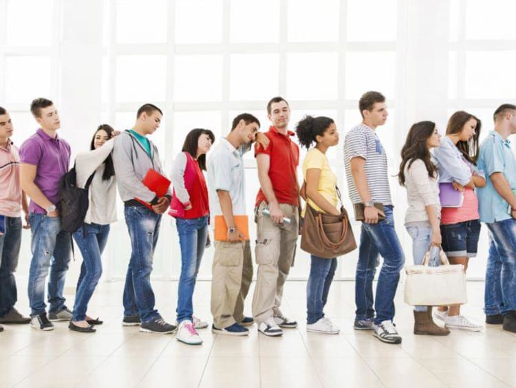 A group of people standing in a line