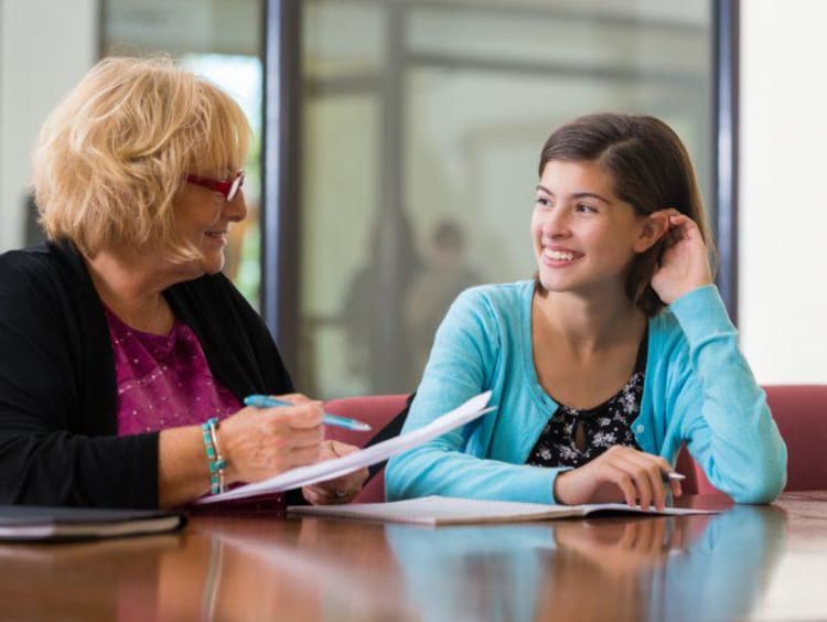 teacher tutoring with a student