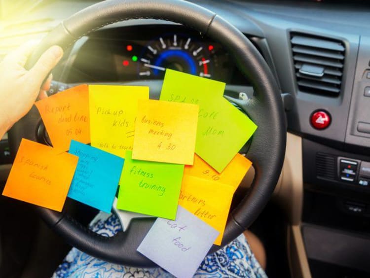 sticky notes on steering wheel