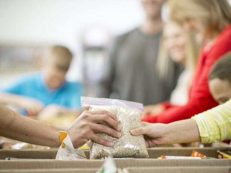 People in line for emergency food boxes