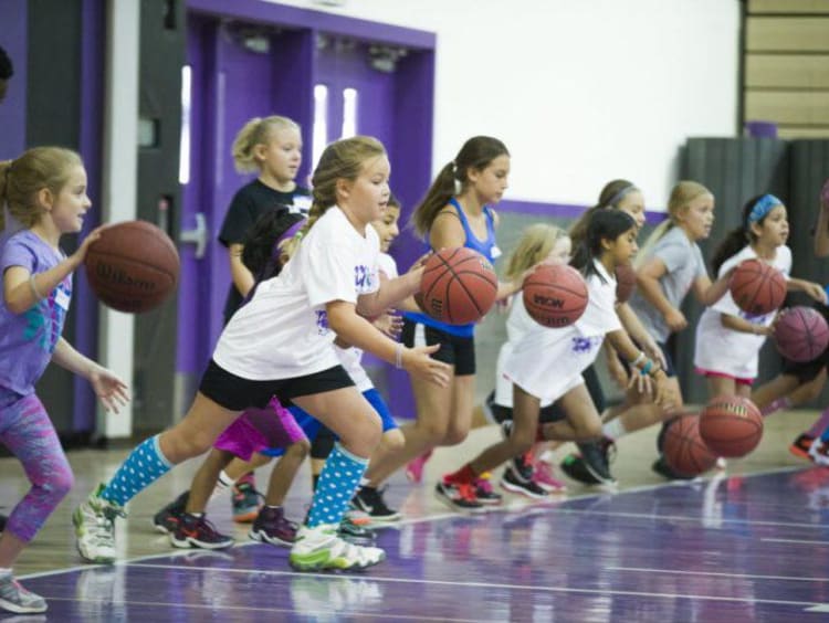 kids playing with basketballs