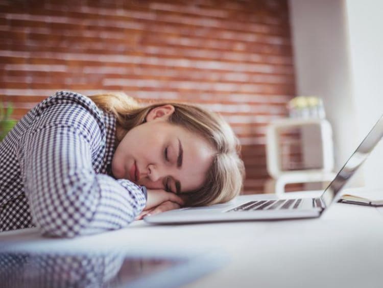 A student taking a nap