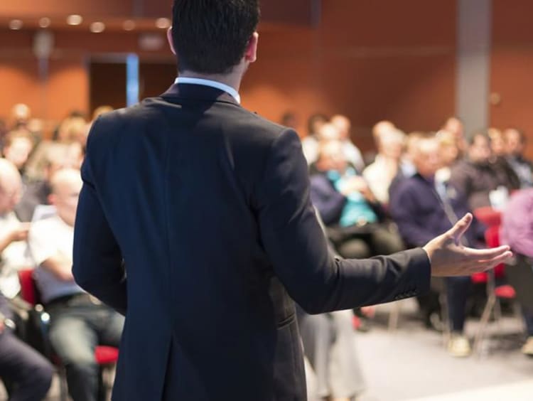 man speaking in public