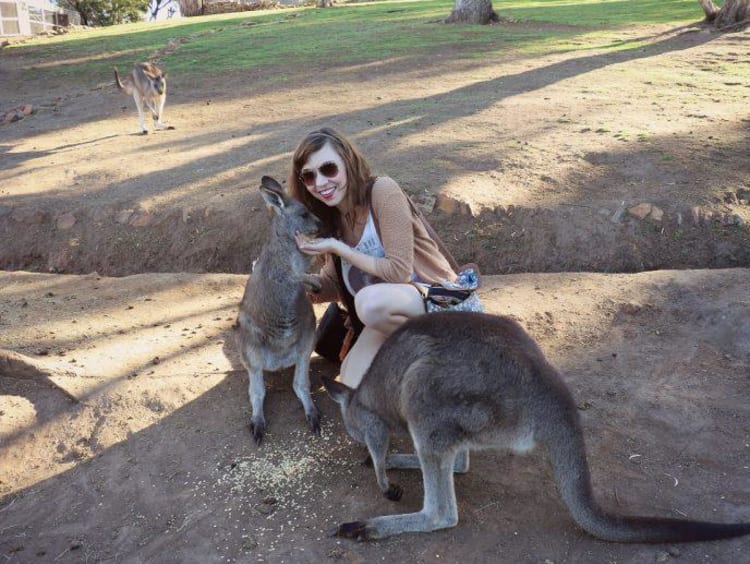 Kate with kangaroos in Tasmania