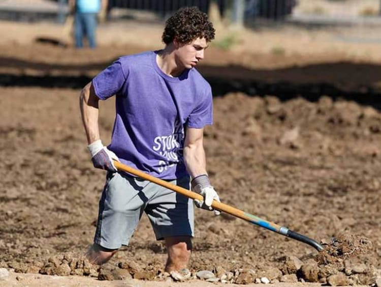 GCU Student doing yard work