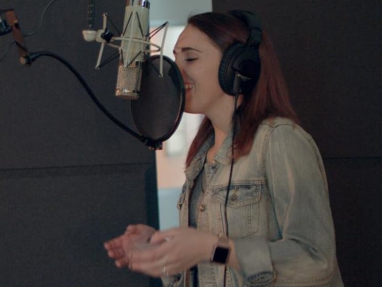 kristyn marie singing in the studio