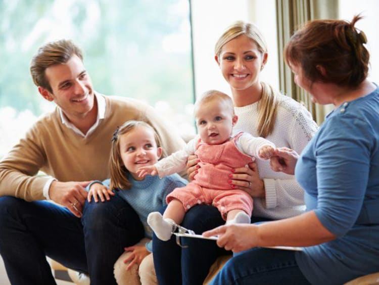 Social worker working with a family