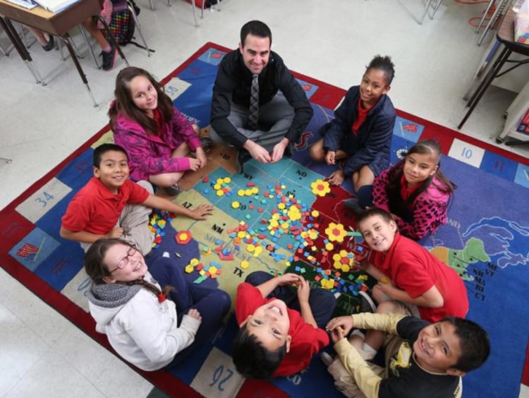 teacher and students in a circle